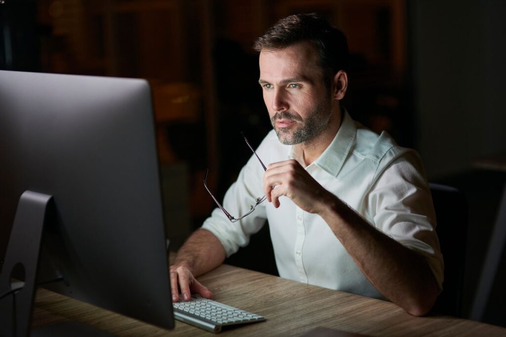 Man in front of laptop