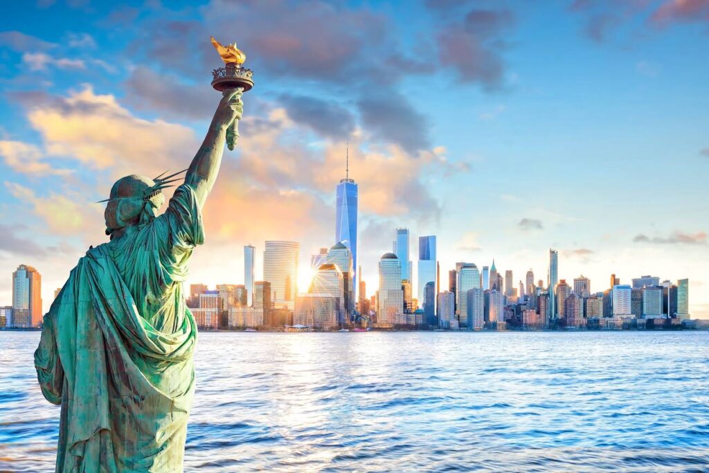 "Is NYC the best place to live" hero image - Statue Liberty looking at NYC